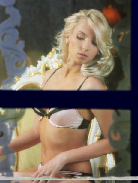 Sexy blonde Adele B takes off her hot lingerie with her window open 59258796