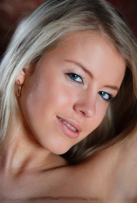 Blonde teen Barbara D releases her beautiful body from satin lingerie 34678513