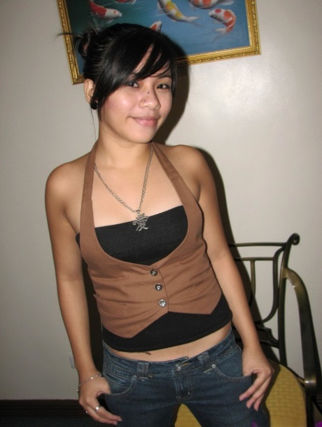Asian teen puts her landing strip pussy on display for the first time 67956227