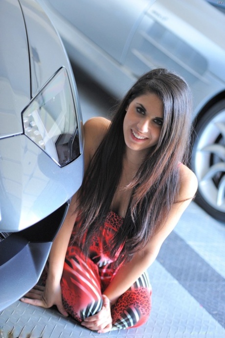 Beautiful teen girl flashing tits and pussy in front of sport's car 50465117