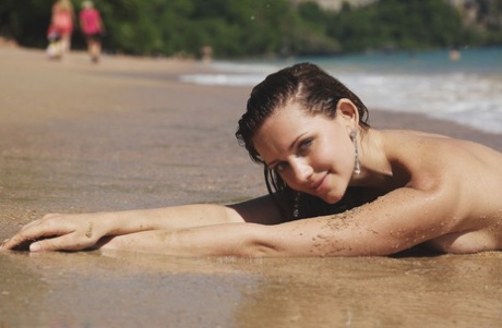 Hot teen Oliana takes a bath after going topless at the beach 69123257