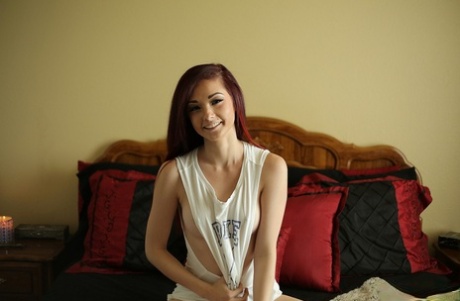 Redheaded girl Kylie Cole exposes a nipple and ass cheeks on a bed 26627695