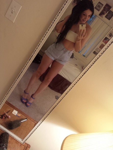 Teen amateur Sabrina Sins sports long hair while taking revealing selfies 70823886