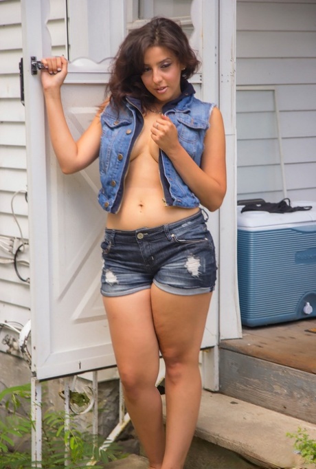 Erotic slut Alexis in shorts teasing with her naked big boobs on the step 23899904