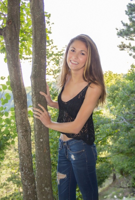 Amateur chick Becca Clark uncovers her nice tits out in the backyard 32556617