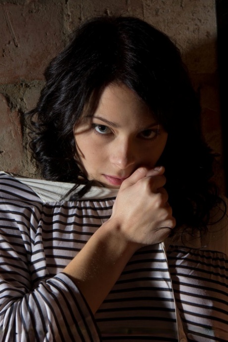 Dark haired teen Bella T finger spreads her tight pink pussy on a wooden chair 26140537