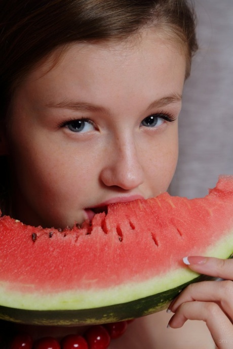 Sweet young Emily Bloom gets watermelon juice on her cute face & shaved pussy 16193472