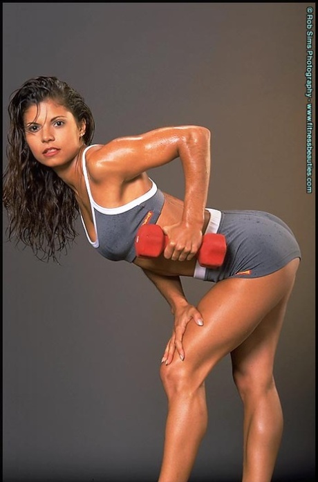 Fitness model Ivica Steffl pumps iron before modelling a bikini 94483276