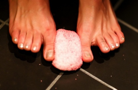 Caucasian girl Kayla Jane Danger crushes a sweet treat with her bare feet 65306191