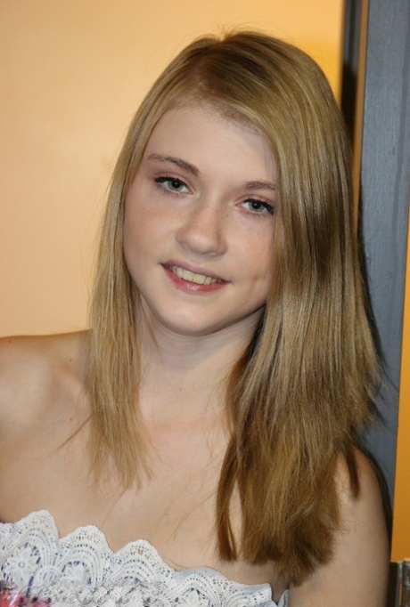 Tiny blonde girl Hannah Hays finger spreads her moist pussy on the toilet 24178019