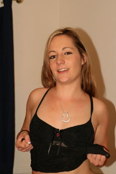 Young first timer Sophie gets totally naked on top of a pink bedspread 13232331
