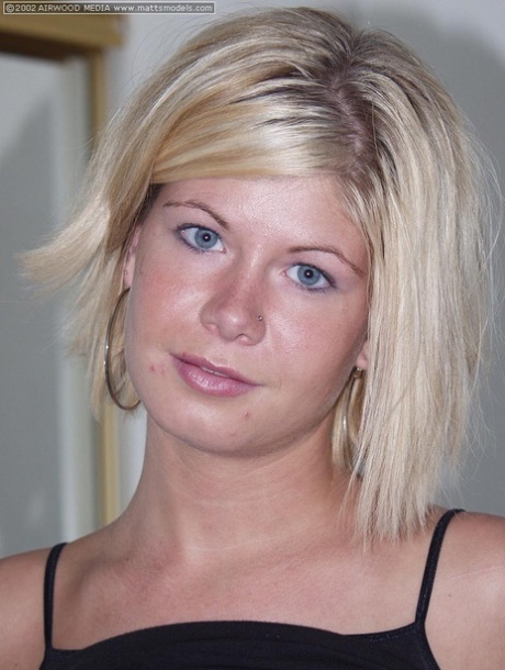 Young blonde girl Heidi admires herself in the mirror before mostly nude poses 96087577