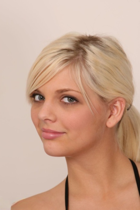 Blonde amateur Jana removes black lingerie to lay totally naked on her bed 92146818