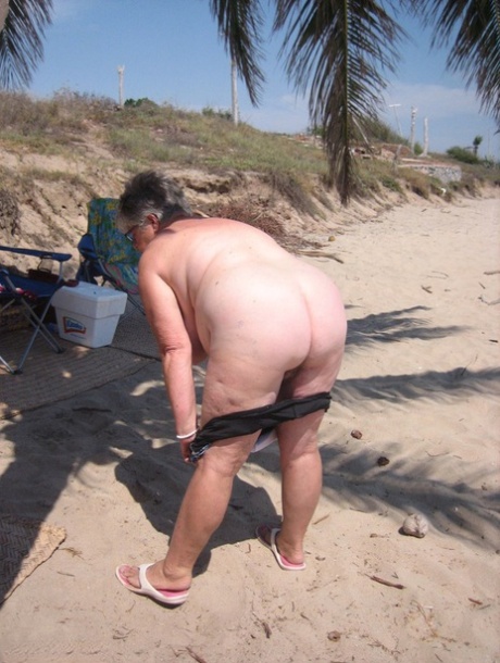 Fat granny Girdle Goddess takes off swimwear to pose nude at the ebach 43709679