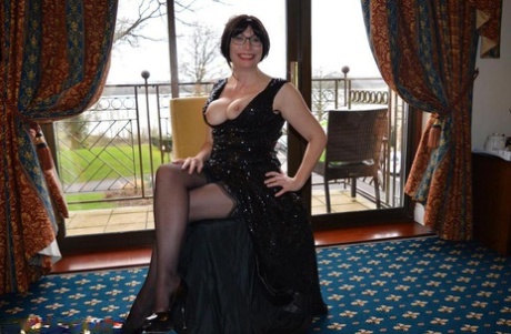 Over 30 amateur Barby Slut slips off a long gown to pose nude in nylons 39199308