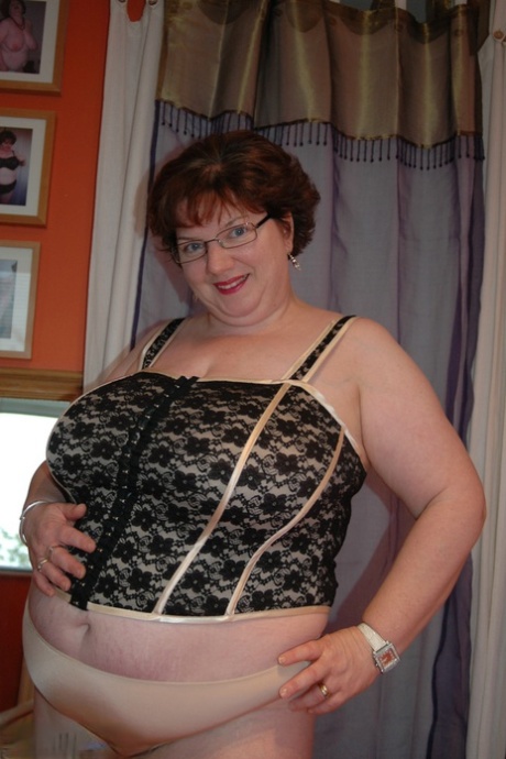 Obese older redhead Chris44g uncovers huge saggy boobs in her underwear 67067631