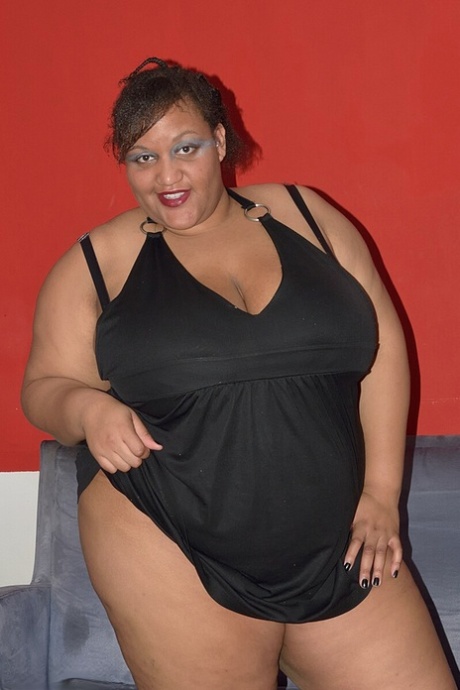 Ebony SSBBW CurvyBunnyB sets loose mega big tits and reveals her massive ass 94028774