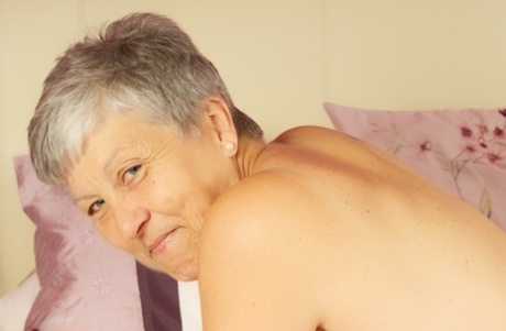 Short-haired nan Savana gets naked on a bed with panties around stiletto heels 82218461