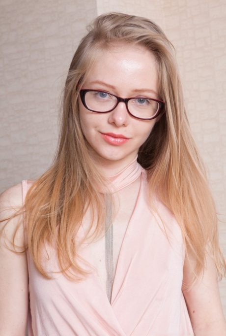 Young blonde Alexandra in glasses spreading hairy pussy lips wide and close up 69023134