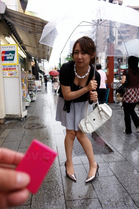 Pretty Japanese chick Ryo Akanishi shows some leg and cleavage while in public 79370842