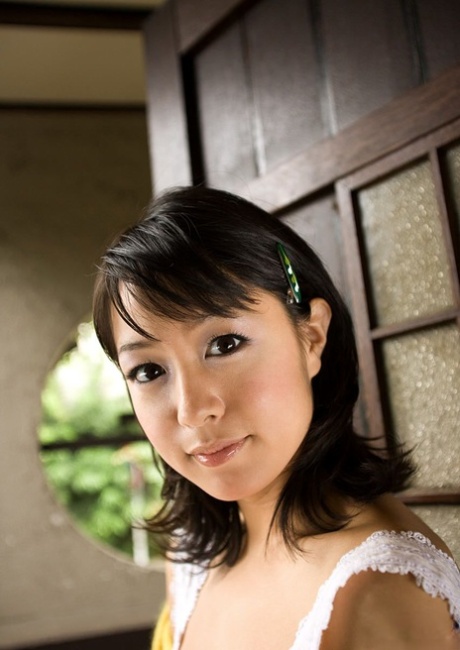 Japanese girl Nana Nanami pulls down cotton panties to show her bush 10602073