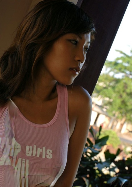 Adorable Japanese teen Asami Ogawa goes topless in thong underwear