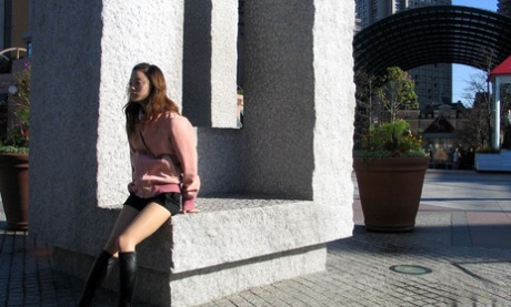 Cute Japanese teen Ayaka models in a red thong paired with black boots 84809910