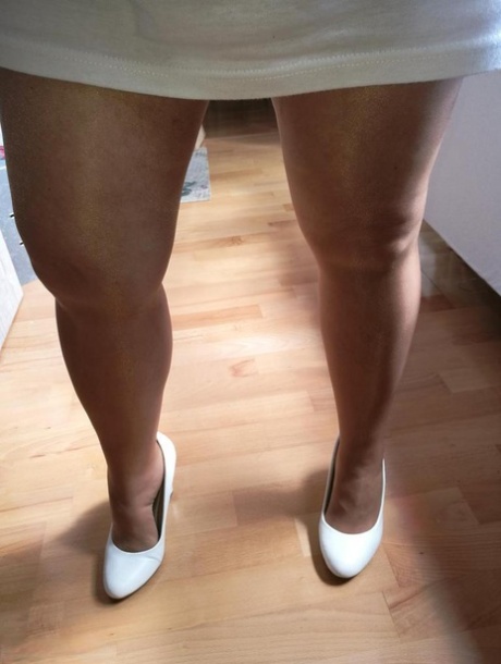 Horny grandmother slides hands down pantyhose to masturbate 69194401