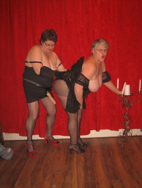 Big titted granny Girdle Goddess and her lesbian girlfriend don strapon cocks 92884865