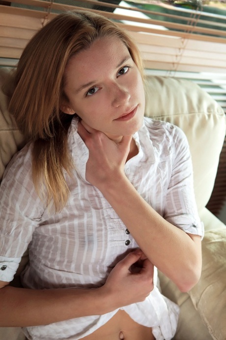 Barefoot amateur holds her face firm before pinching an exposed nipple 21911151