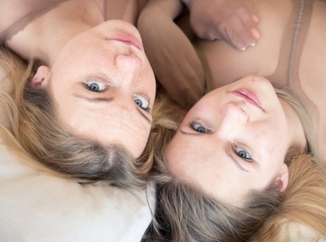 Elizabeth L and Emma O have strapon lesbian sex while encased in pantyhose 11882115