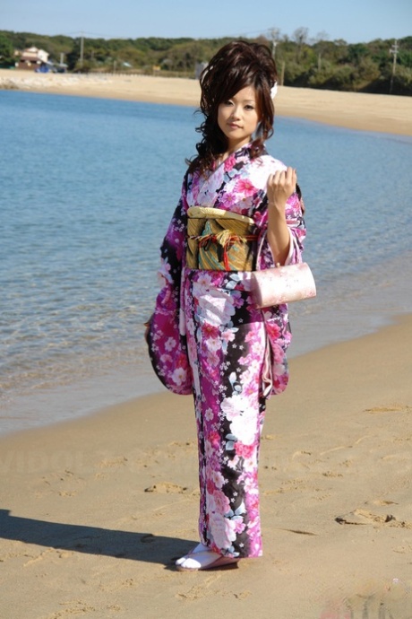 Asian model Chiaki strolls along the beach and surrounding area in a kimono 63010954