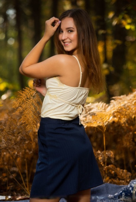 Solo girl Ava puts her hot ass on display during nude poses in the forest 97391434