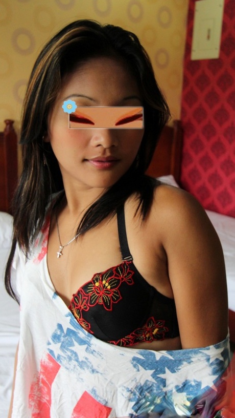 Asian amateur has sex with a white guy on a bed while wearing stockings 99234555