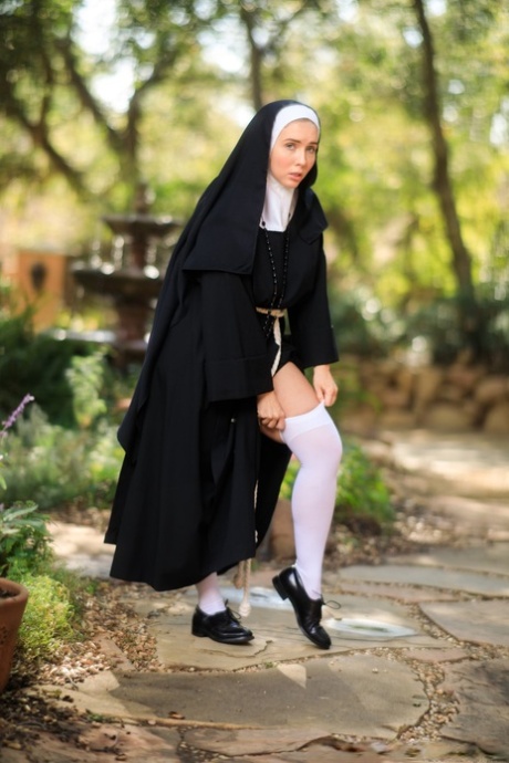 Thick Nun exposes herself in the courtyard wearing over the knee socks 19890799