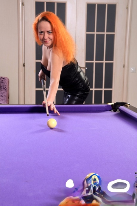 Redhead amateur Natali shows her bush on a pool table after getting naked 52194778