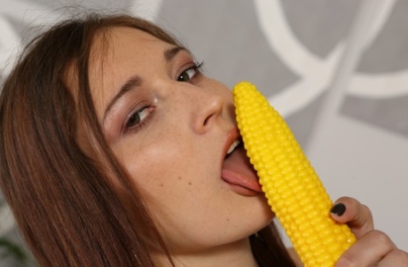 Nice girl Mina takes a corncob vibrator to her horny pussy on a sofa 67657282