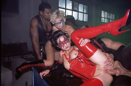 Latex attired chicks drip jizz from tongues after group sex action 22193076