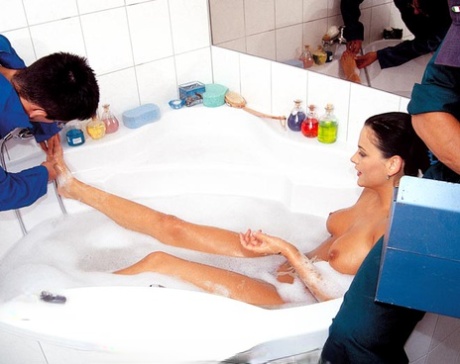Dark haired teen sucks a couple of dicks while taking a bubble bath 35635652