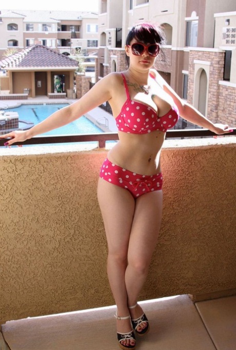 Amateur girl Susy Rocks models a polka-dot bikini in shades on a balcony 41259684
