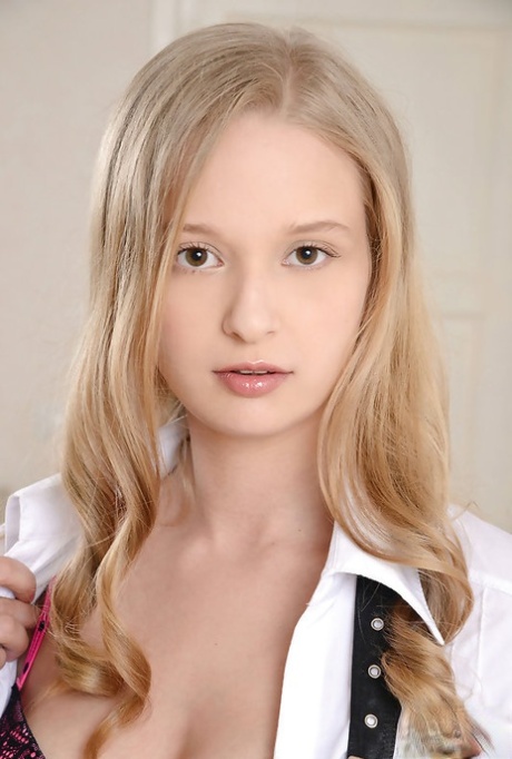 Blonde student Inga opens her white blouse to expose her bra 27722625