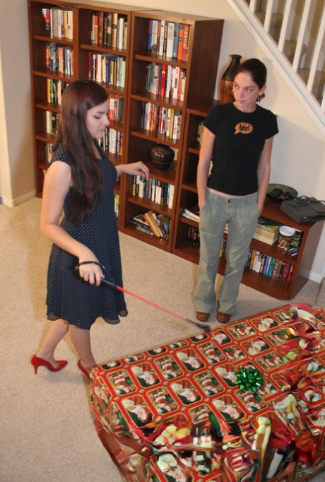 Naked girl is freed from a box before worshiping lesbian's feet 76578265