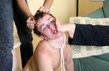 Two girls top a submissive boy during CFNM play in a living room 40298813
