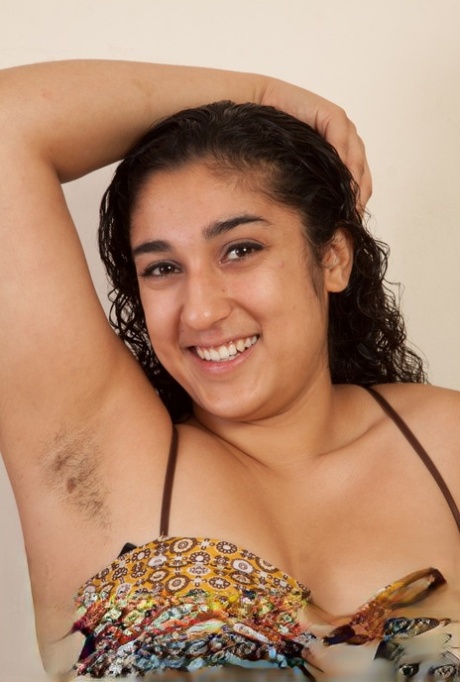 South American solo girl shows off her unshaven armpits and twat in stockings 88050478