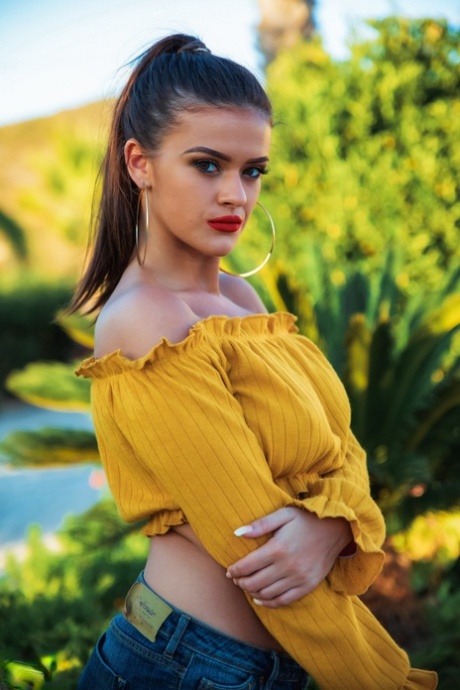 UK model Brook Wright sports red lips while uncovering her great tits 83350821