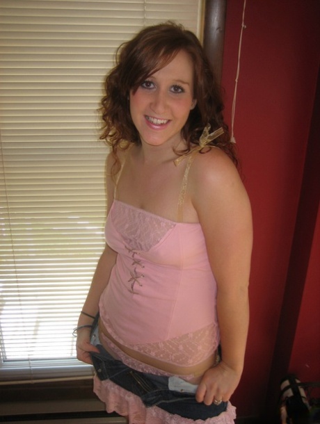 Redheaded teen picks up a sex toy after showing her natural tits and pussy 66747661