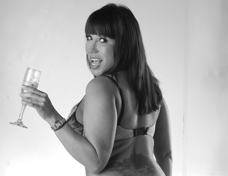 Asian woman Ava Devine pours alcohol on her huge breasts in solo action 87561596