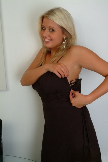 Blonde solo girl Emily Brady plays with her hooters in black lace panties 62136691