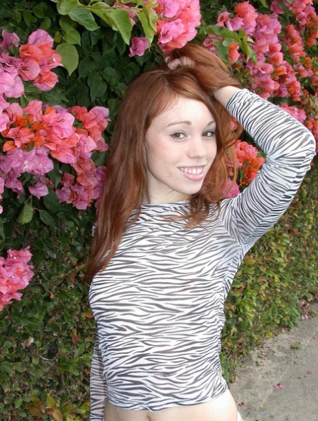 Sexy redhead Rose Bud flaunts her small tits & sexy pussy at beach playground 23200538
