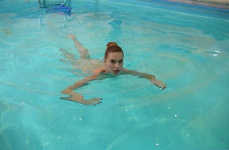 White teen Ilona C wears her hair back during sex with the old pool cleaner 18233915